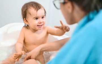happy-1-year-old-baby-bathtub