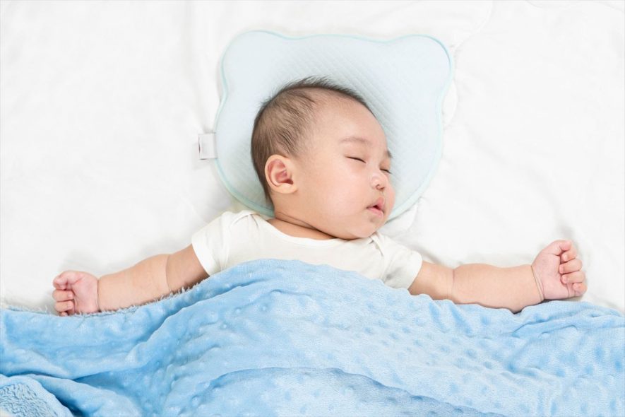 A baby head shaping pillow can help prevent flat head syndrome on babies