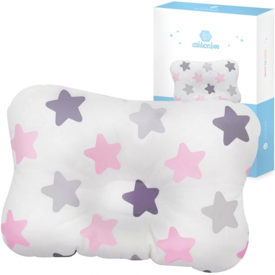 A baby head pillow with star design from Ashtonbee