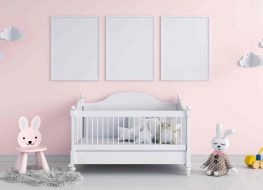 pink baby nursery with a convertible crib