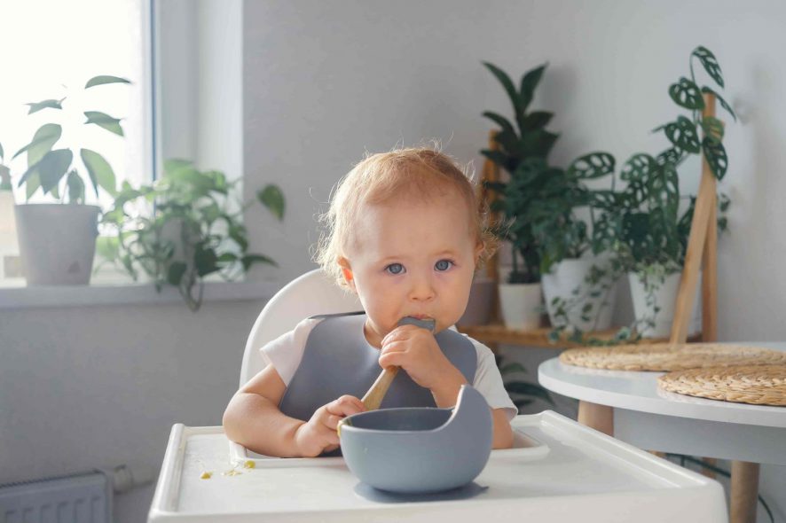 baby with bowl suction and spoon