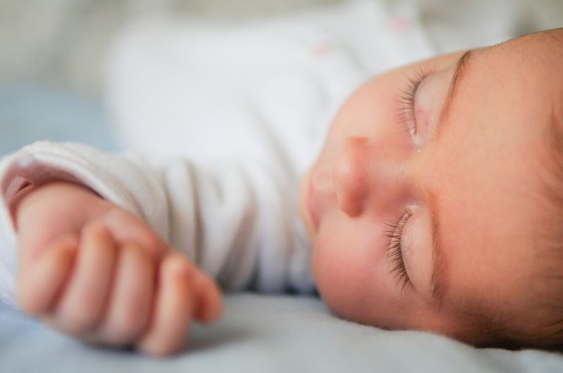 are baby hammocks safe for newborns - closeup of a baby’s sleeping face