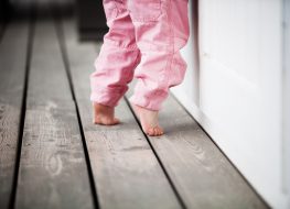 little girl toe walking