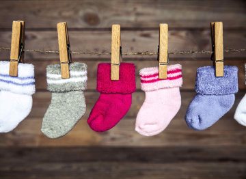 socks for babies - Socks clipped on a clothesline