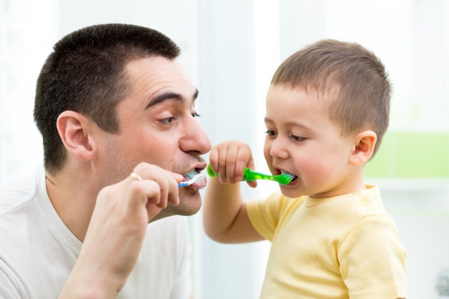 brushing teeth with parents 
