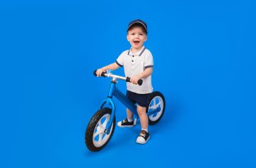 when can a baby ride in a bike seat