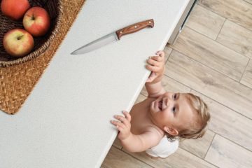 kitchen knife on table top - Baby Proofing Tips